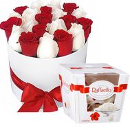 Червоні та білі голландські троянди в коробці