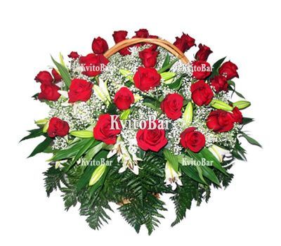 Basket of roses, lilies and gypsophila