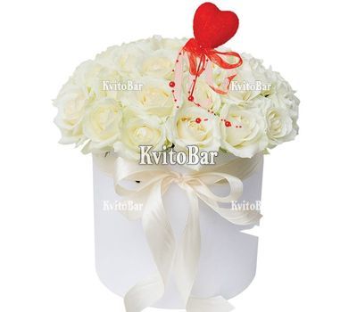 Bouquet of white roses in a box
