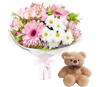 Bouquet of flowers with a toy